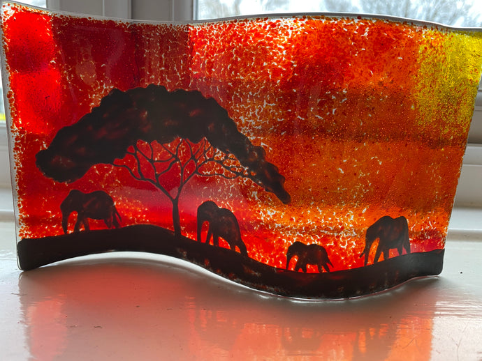 Handmade fused glass self standing elephant sunset