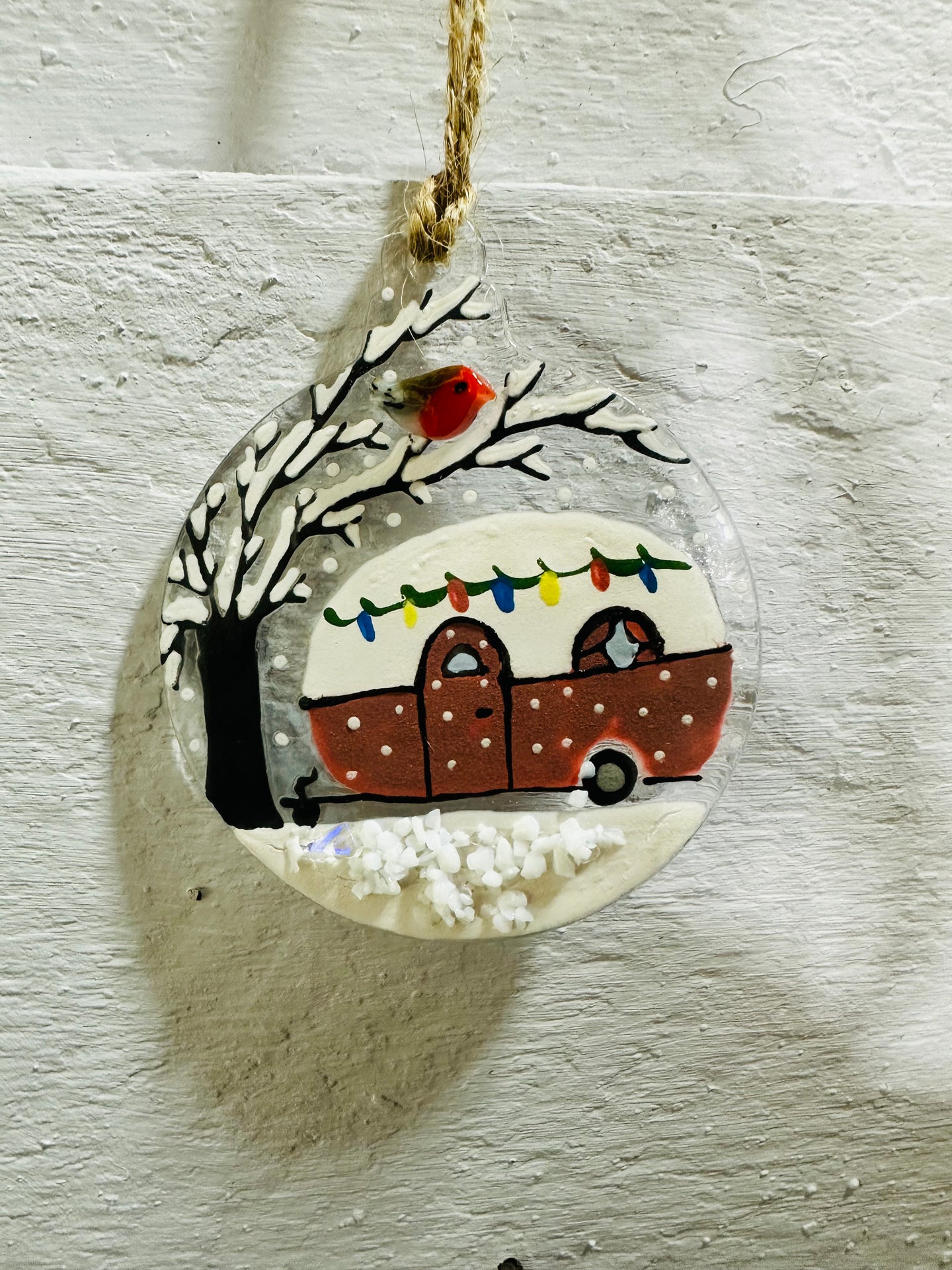 Handmade fused glass Christmas Bauble with red caravan detail 