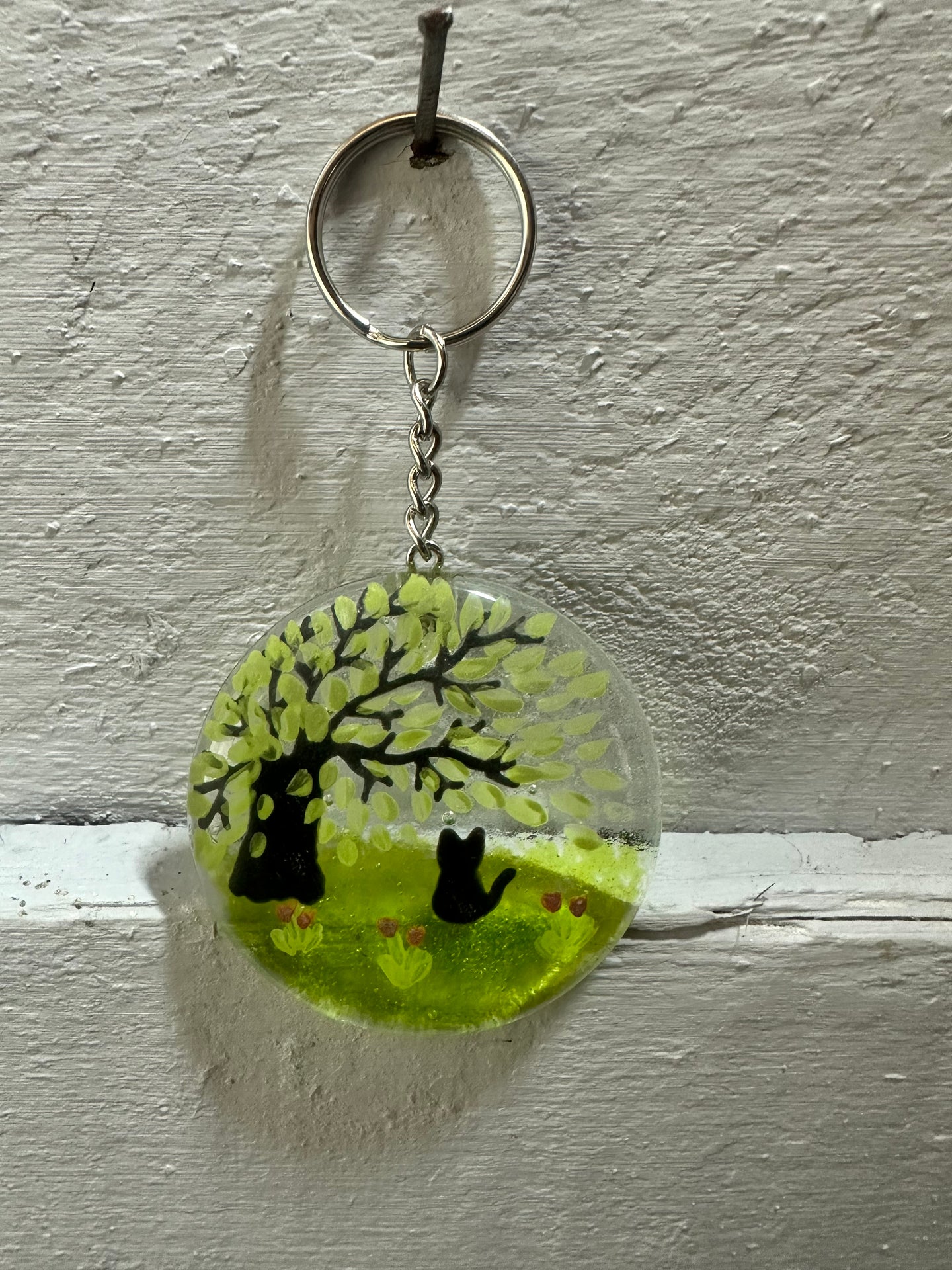 Handmade fused glass round keyring with personailised cat detail 