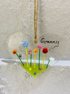 Handmade fused glass hanging heart with granny and flower detail 
