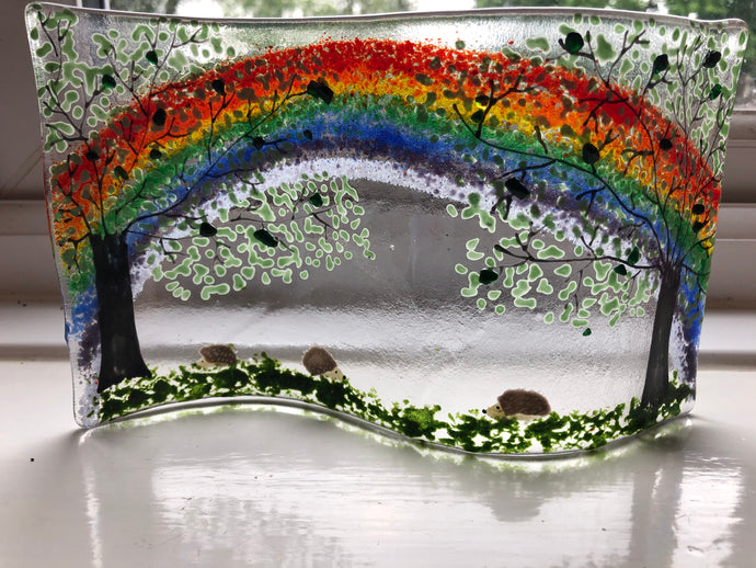 Handmade fused glass rainbow with hedgehog detail 