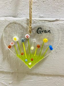 Handmade fused glass hanging heart with gran and flower detail 