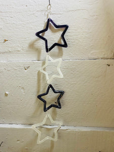 Chain of four hanging Stars