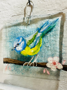 Handmade fused glass blue tit wall hanger with blossom detail 