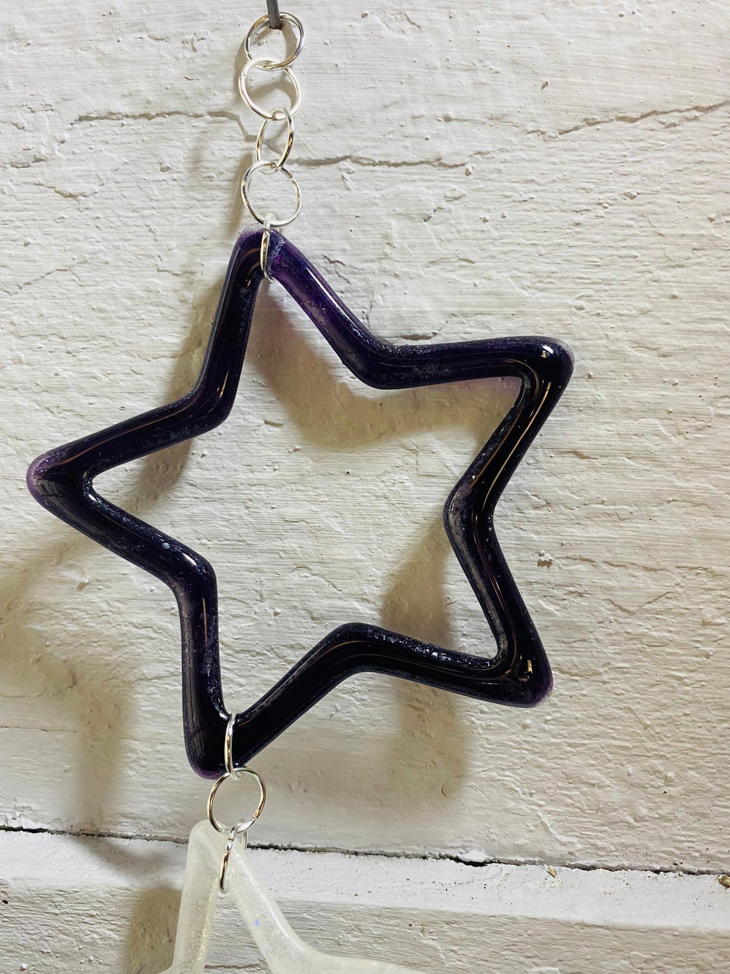 Chain of four hanging Stars