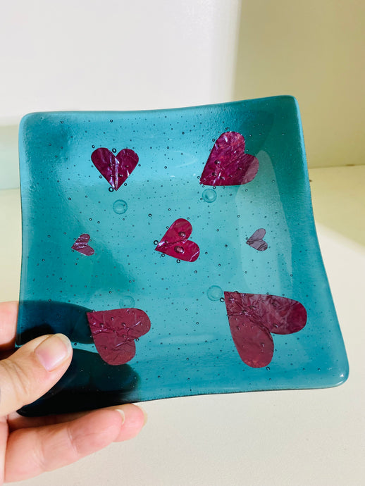 Fused glass teal dish with copper hearts 
