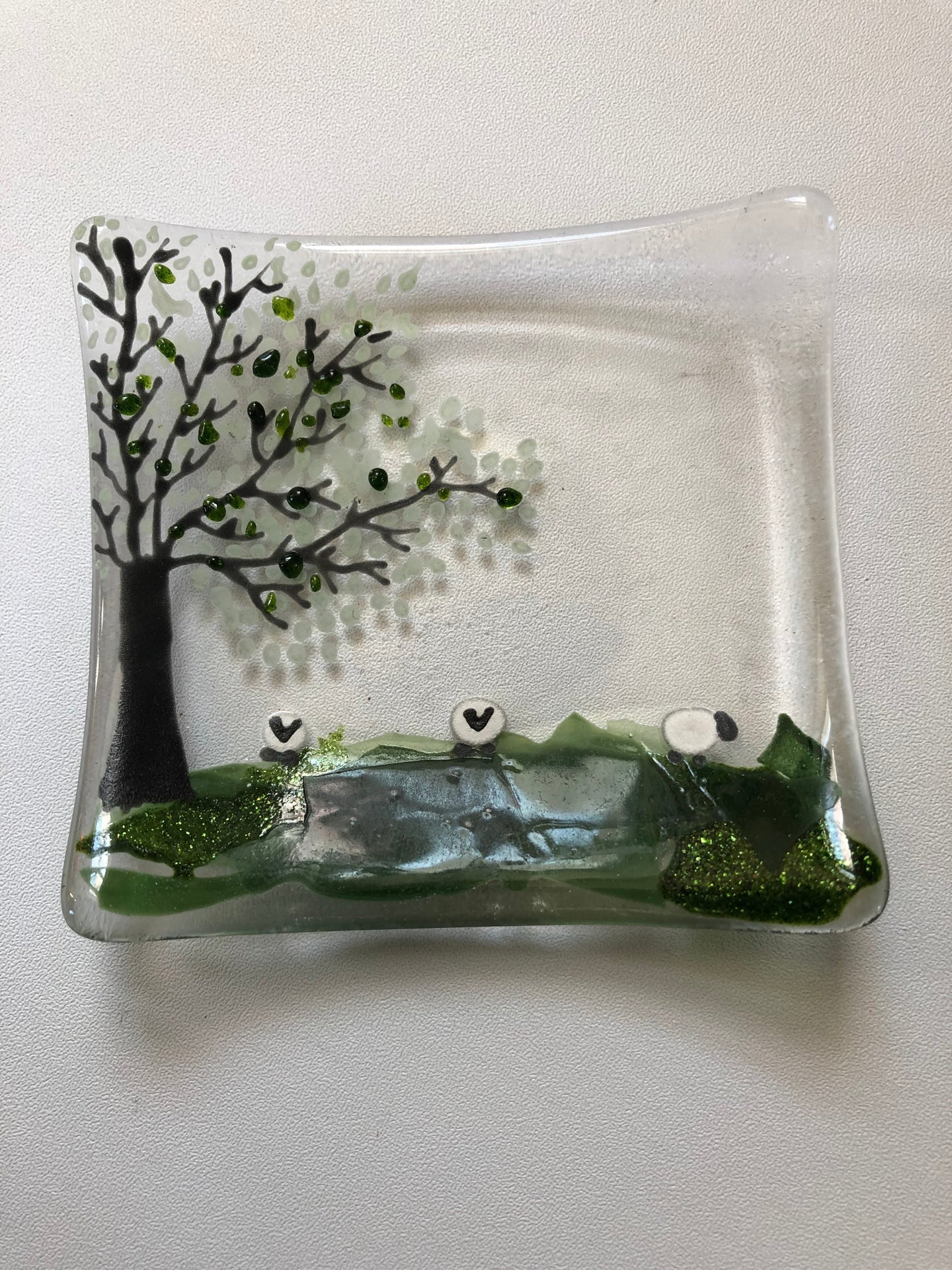 Fused glass trinket tray with countryside and sheep detail 