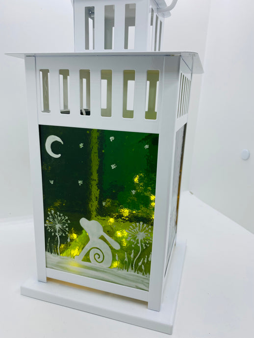 Fused glass lantern with different colour panels with moon hare detail 